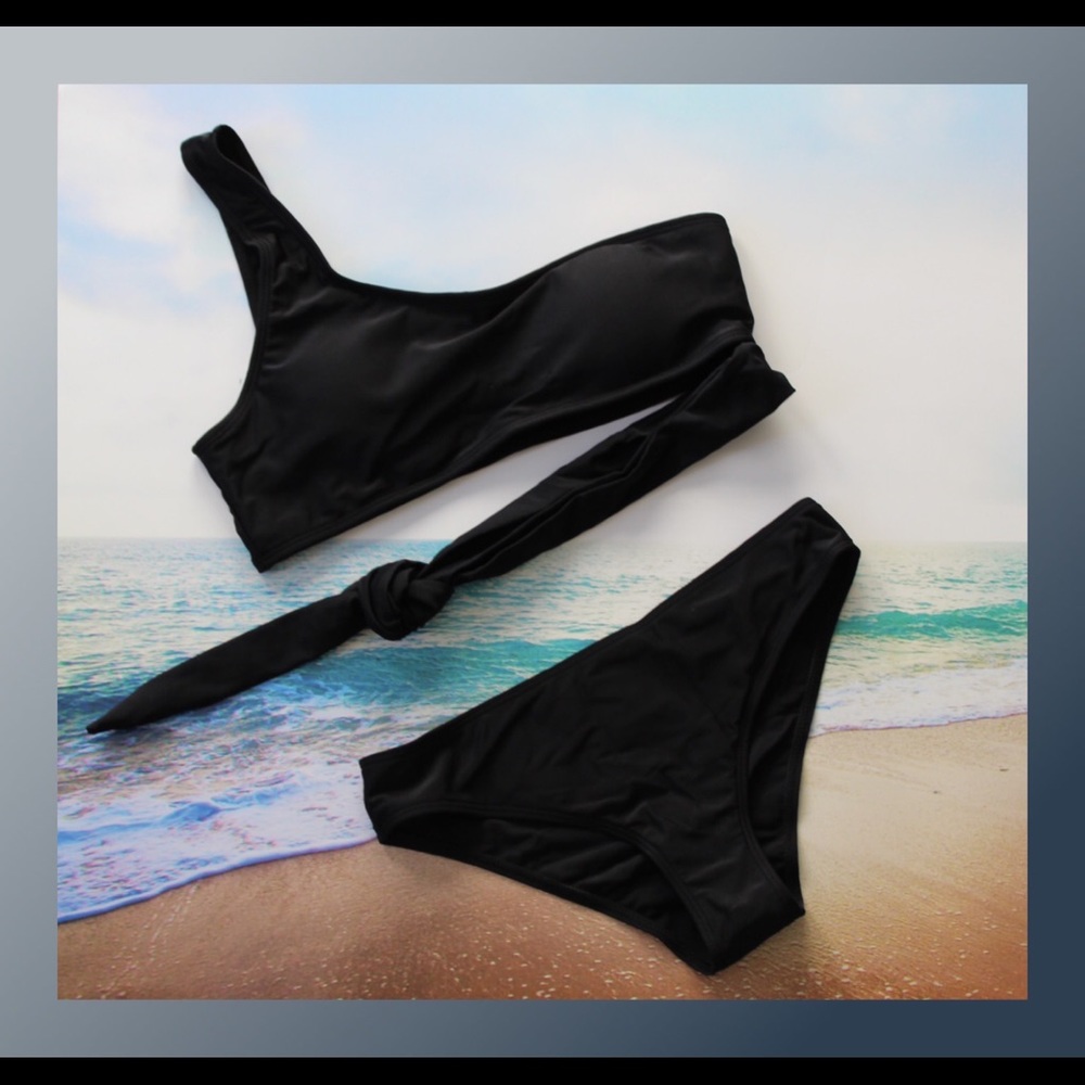 Never worn Black Tie Suit